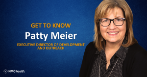 photo of woman wearing glasses and smiling with text Patty Meier Executive Director of Development and Outreach